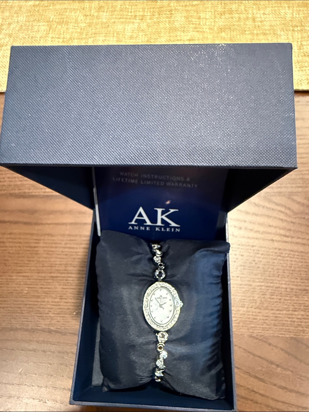 Anne Klein Silver and Crystal Oval Bracelet Watch